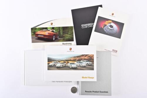 PORSCHE: Six Porsche issued brochures, booklets from the 2000's