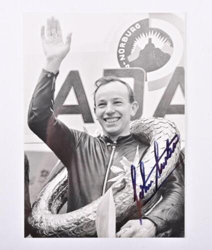 JOHN SURTEES: A signed photograph of John Surtees on the podium after winning the 1963 Nurburgring 1000 Kms