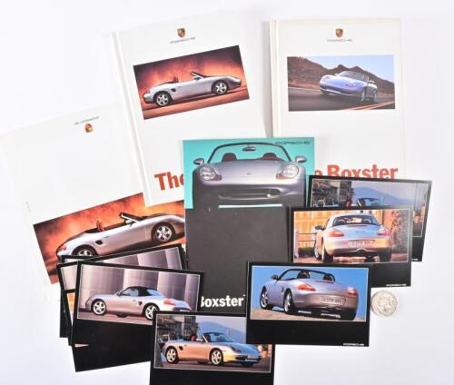 PORSCHE: A collection of circa 2000's Boxster items, including to hardback brochures