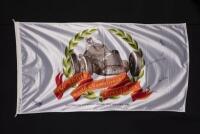 GRAND PRIX: A officially licensed large "Australian Formula 1 Grand Prix Adelaide 1990" flag hand signed by Stewart, Hulme, Fangio, Moss and Brabham, reading; "The 500th World Championship Grand Prix", made by "The flag centre of Australia", 95cm high x 1