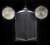 BENTLEY: A decorative Bentley MkVI display including a radiator surround and pair of P100 headlamps