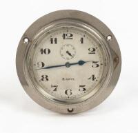 DASHBOARD CLOCK: A circa 1920s bevelled edge low profile 8 day dashboard clock, Swiss made, possibly by Meridus, 9.5cm diameter, 1.2cm deep