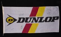DUNLOP: A autographed 1996 Dunlop flag, signed by Dick Johnson; John Bowe; Wayne Gardner; Larry Perkins; Russell Ingall; Wayne Russell; John Trimbole