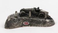 BUGATTI: A metal model of Bugatti Type 35B racing uphill by K. Mason, with Bugatti logo to the front and rear, signed and dated: K Mason '94 to one side and numbered to the other, 18cm wide