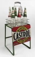 CASTROL: Six original Castrol oil bottles in carrier on earlier Castrol Wakefield display stand