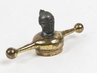 RADIATOR CAP: A brass knights head mounted dog bone radiator cap, 8cm high, 18cm wide