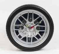 WALL CLOCK: A novelty wall clock in the form of a tyre