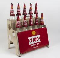 SHELL: A rare circa 1960s Shell X-100 10-bottle oil rack with bottles