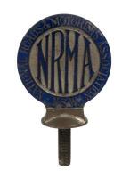 NATIONAL ROADS AND MOTORISTS' ASSOCIATION: A circa 1920s National Roads and Motorists' Association (NRMA) of NSW enamelled bronze car badge by Angus & Coote of Sydney