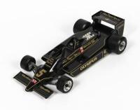 LOTUS: A 1:14 scale Burago John Player Special Lotus Mk4 Mario Andretti #5 model