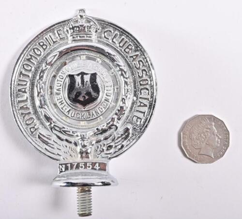 ROYAL AUTOMOBILE CLUB ASSOCIATION: A Royal Automobile Club Associate Auckland chromed and enamelled brass car badge, membership number: N17554, 11.1cm high, 9.2cm wide