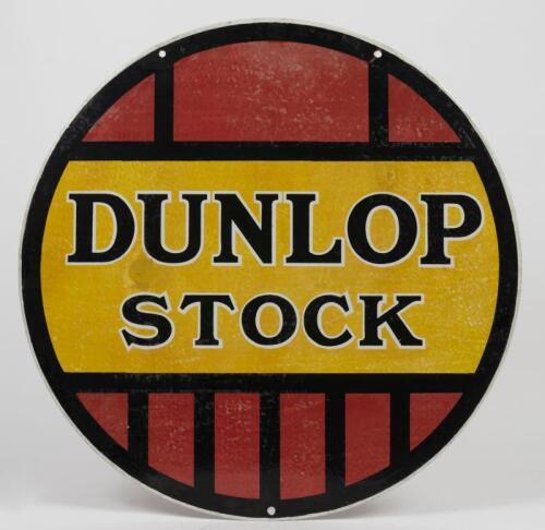 DUNLOP: A circa 1930s double sided Dunlop Stock enamel sign, 65cm diameter