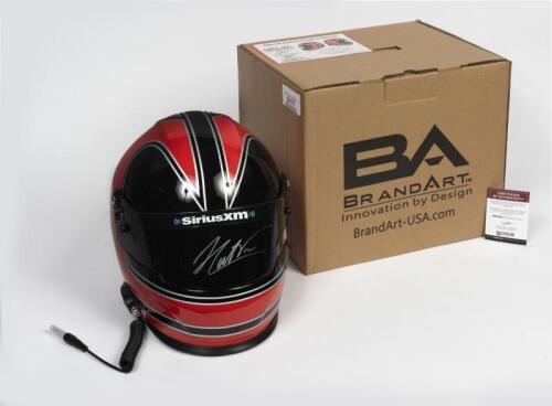 A full-size replica helmet signed by 4-time Indy 500 winner and 2-time Dayton 24 Hour winner Helio Castroneves. Signature on visor with COA from Pristine Authentic with helmet bag and box.