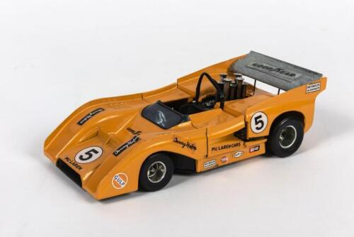 DENNY HULME: A 1:26 Polititoys scale model of the Denny Hulme McLaren Chevrolet M8F Can Am as driven by Denny Hulme