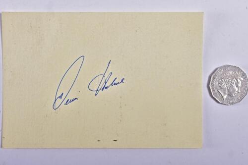 DENNY HULME: A yellow card signed by racing driver Denny Hulme in blue ink, believed to be circa 1970s/1980s, 10.5cm high x 15.5cm wide.