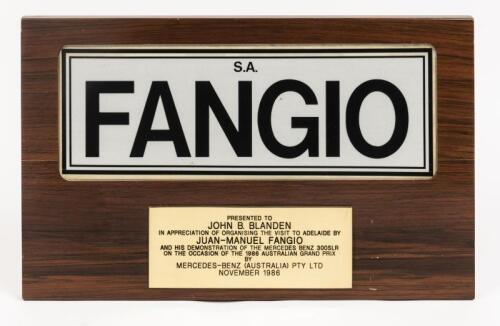 FANGIO: A South Australian mounted number plate "FANGIO", 27.5 x 44.5cm overall