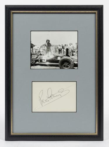 PIERS COURAGE: A framed original photograph and signature of Piers Courage in his Brabham BT26A Frank Williams Racing Cars 1969, window mounted, framed and glazed, 34 x 24.5cm overall