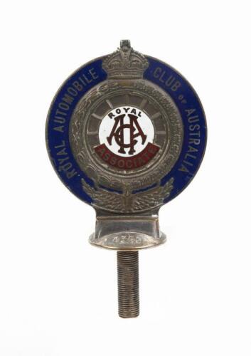 ROYAL AUTOMOBILE CLUB OF AUSTRALIA: A circa 1920s Royal Automobile Club of Australia (RACA) Associate enamelled cast metal car badge by Amor Sydney