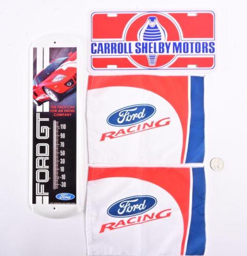 FORD: A collection of 4 Ford related items including a thermometer, flags and a dealer number plate