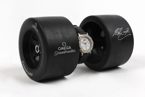OMEGA/SCHUMACHER: A 1996 Omega Speedmaster box with printed Michael Schumacher signature