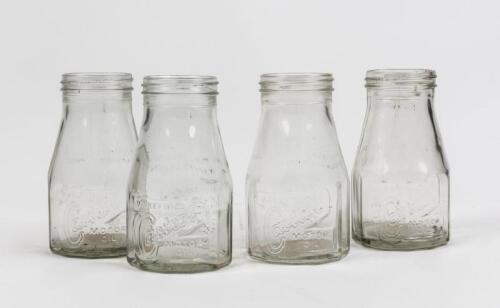 CASTROL WAKEFIELD: Four original Castrol Wakefield 1 pint glass oil bottles, each 16cm high