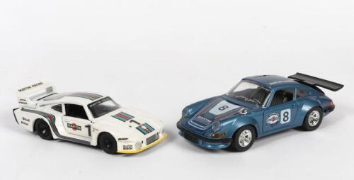 PORSCHE: Two racing Porsche models, scale 1:24 Burago Porsche 911 and 1:28 Eidai co Porsche 935, metal and unboxed