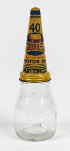 GOLDEN FLEECE OIL BOTTLE: A Golden Fleece 40 grade 1 pint glass oil bottle and tin top, 28cm high