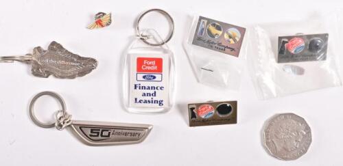 FORD: A collection of Ford keyrings and pin badges