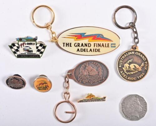 ADELAIDE GRAND PRIX: A collection of keyrings and pin badges relating to the Adelaide Grand Prix