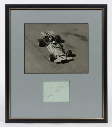 GRAHAM McRAE: A framed original photograph and signature of Graham McRae in the McRea GMI, window mounted, framed and glazed, 44 x 38cm overall