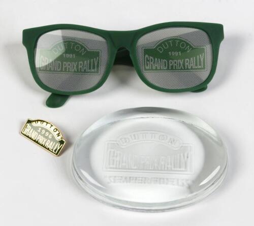 DUTTON GRAND PRIX RALLY: A group of Dutton Grand Prix rally memorabilia, comprising pair of sunglasses, a paperweight and a pin