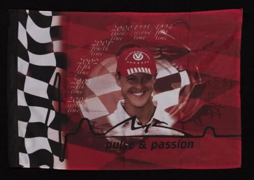MICHAEL SCHUMACHER: A small flag