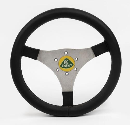 LOTUS: A vintage Lotus cushioned leather steering wheel, 29cm diameter