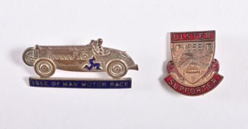 LAPEL BADGES: Two car racing lapel badges, comprising an Isle of Man Motor Race badge and an ulster TT supporter's badge, the largest 3.5cm wide