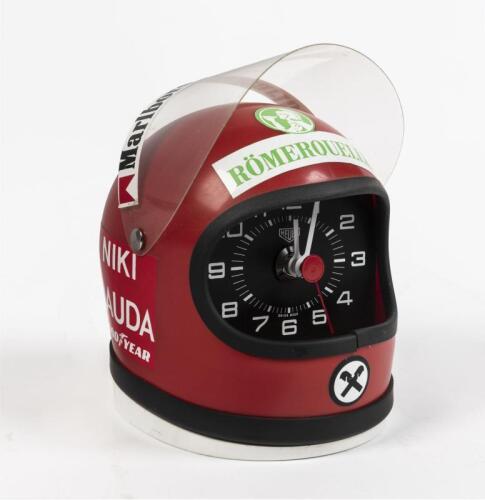 NIKI LAUDA: A novelty clock in the form of Niki Lauda's helmet, 11.5cm high