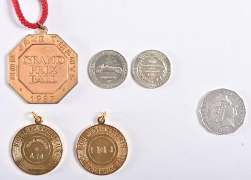 GRAND PRIX BALL: Three medallions form the Bob Jane T-Marts Grand Prix ball, 2 from 1988 and one from 1987, together with 2 commemorative medals of the 500th Grand Prix in Adelaide, 1989