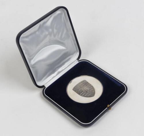 PORSCHE: A cased medallion commemorating a 50 year anniversary, 7cm diameter