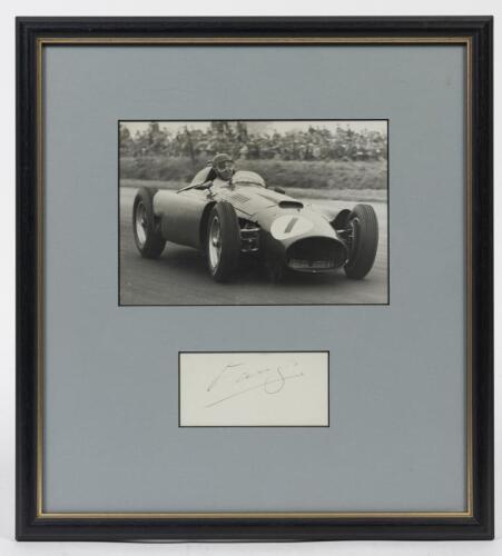FANGIO: A framed original photograph and signature of Juan Manuel Fangio, window mounted, framed and glazed, 36 x 33cm overall