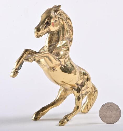 FERRARI: A solid brass prancing horse in the Ferrari style, 17.5cm high