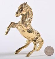FERRARI: A solid brass prancing horse in the Ferrari style, 17.5cm high