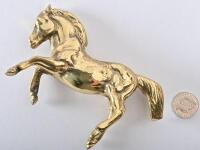 FERRARI: A solid brass prancing horse in the Ferrari style, 17.5cm high - 2