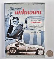 TONY GAZE OAM DFC**: "Almost Unknown" hardcover book by Stewart Wilson, signed in blue ink to insert on flypage