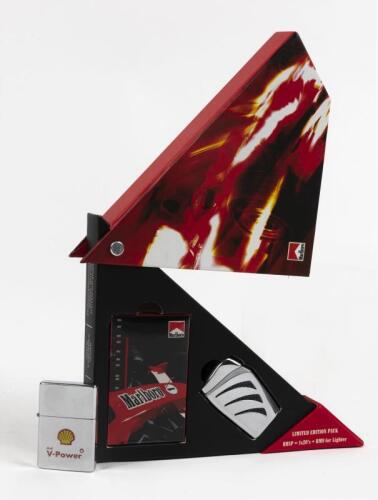 MARLBORO/FERRARI: A limited edition Marlboro pack of 20 and lighter, together with a Shell branded Zippo style lighter