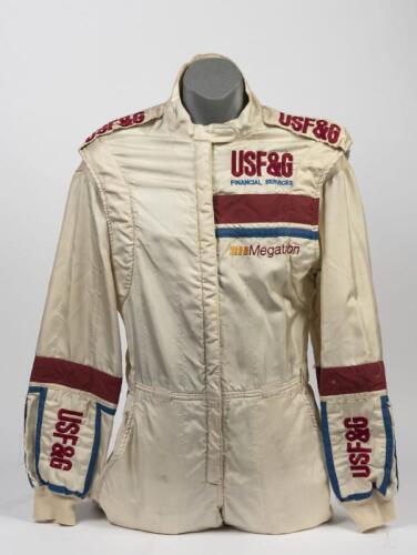 DEREK WARWICK: A circa 1987 'Stand 21' "USF&G Financial Services" Formula 1 race suit purported to be used by Derek Warwick in 1987, personal sponsor patch removed from left hand chest which was likely Camozzi Pneumatics.