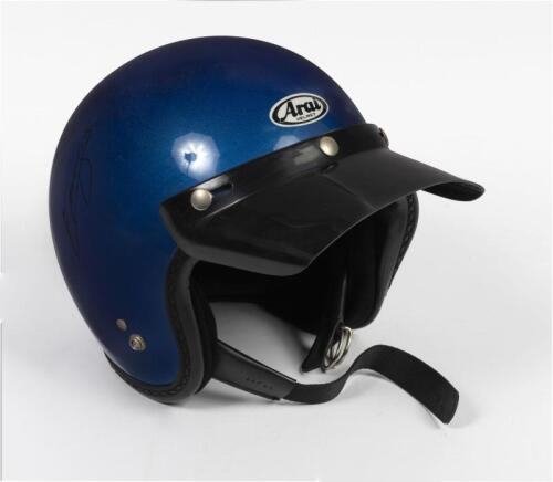 FANGIO: A circa 1980 Arai 'Challange R' open face helmet in blue, with visor, signed in black marker by J.M. Fangio, XL size.