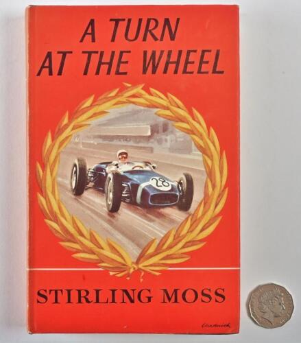 Stirling MOSS: A signed copy of "A Turn At The Wheel" hardcover first edition autobiography, signed in blue ink to the flypage by Stirling Moss