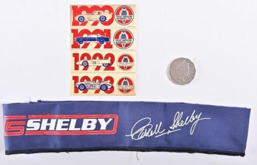 SHELBY: A Shelby branded neckerchief and four Shelby American Automobile Club member plaques 1990-1992