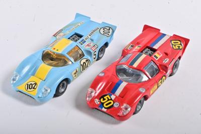 SUPER CHAMPION: Two rare vintage 1:43 scale Lola-Chevy T70 MK3B #102/#50 "1000 Km DE PARIS" 1967 NORINDER racing car models by Super Champion