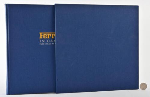 FERRARI: A signed copy of "Ferrari In Camera, from Ascari to Villeneuve" limited edition hardcover book, signed and personalised to title page by Geoffrey Goddard, Doug Nye, dark-blue cloth-bound hard covers, numbered 335 of 1000, published by Palawan pre