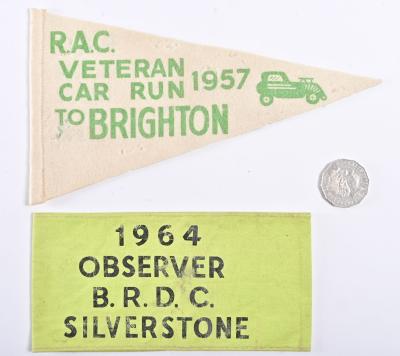 PENDANT/ARMBAND: A 1964 Observer armband from Silverstone and a 1957 pendant from the RAC Veteran Car Run to Brighton